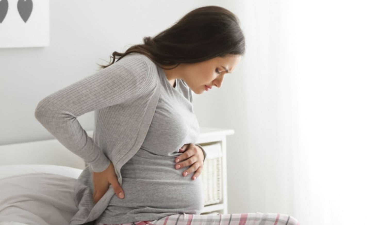 علت های کمر درد در دوران بارداری